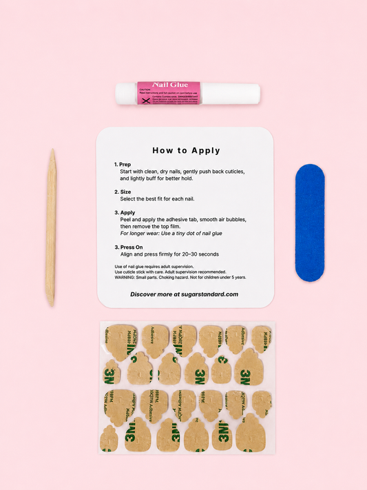 Tween press-on nail kit with adhesive tabs, nail glue, mini file, cuticle stick, and instructions