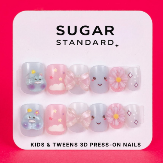 Tween 3D press-on nails with pastel charm nail art