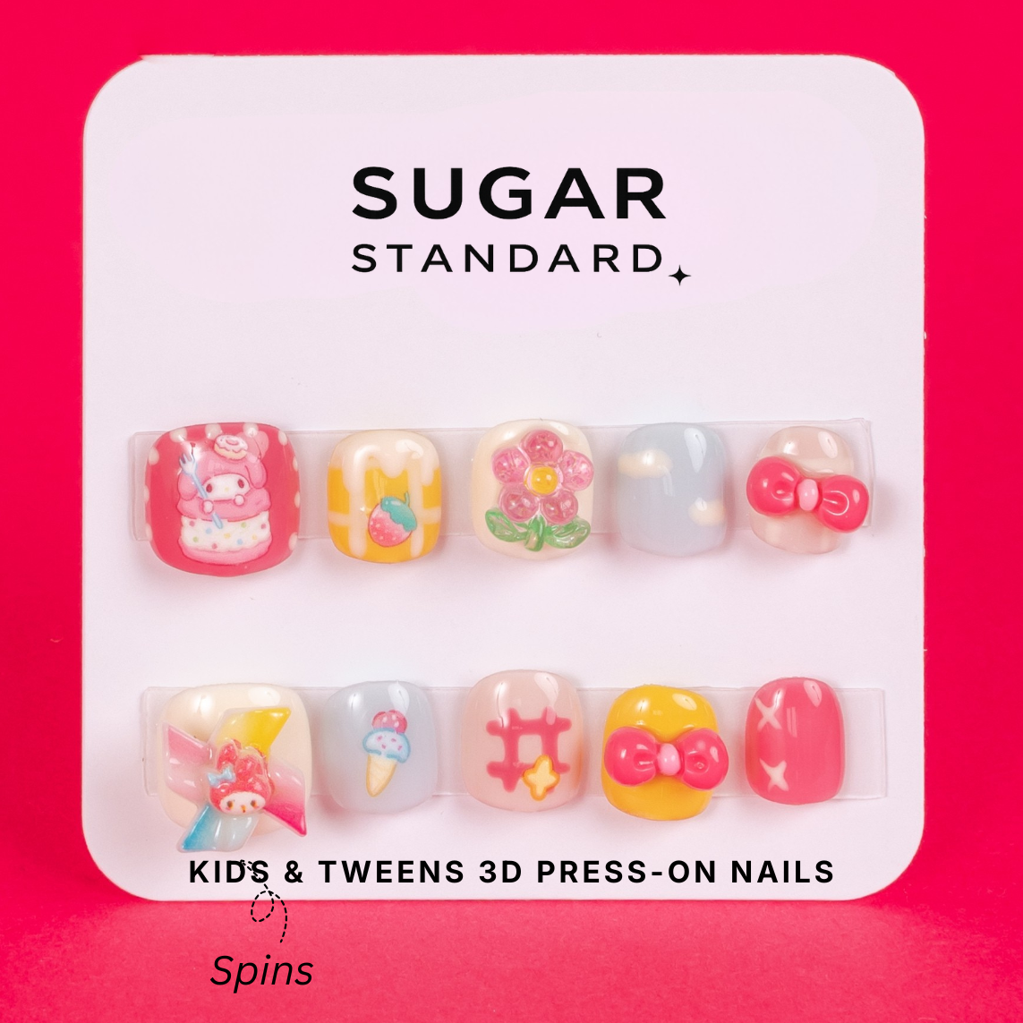 Tween 3D press-on nails with playful spinning charm design