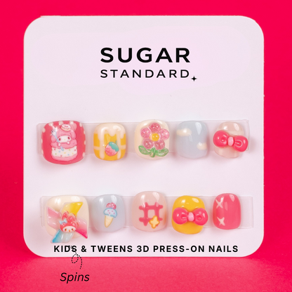 Tween 3D press-on nails with playful spinning charm design